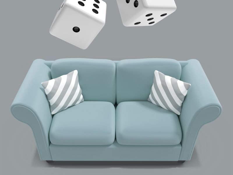 3D-Bild von zwei Würfeln, die auf ein Sofa fallen – 3D-Design erfreut sich immer größerer Beliebtheit – Bild