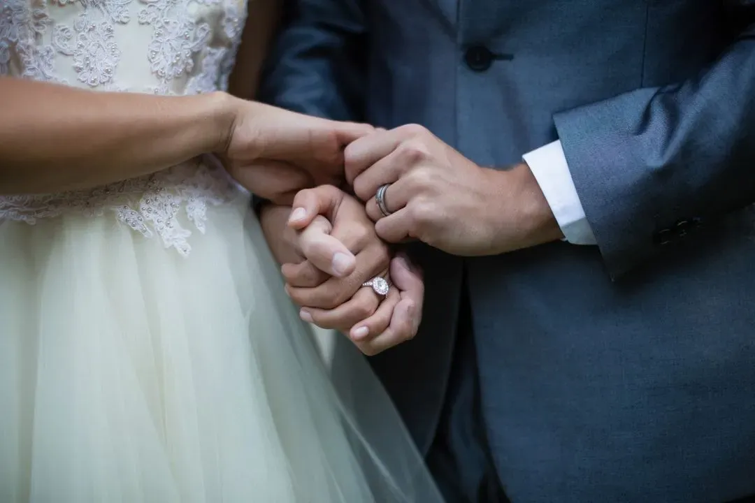 Wedding couple holding hands - Image