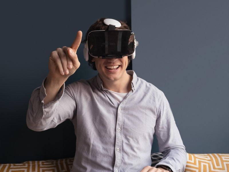 Man wearing virtual reality headset - VR birthday party ideas - Image