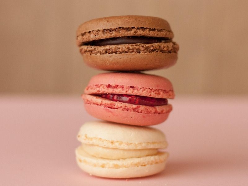 Image of stacked colorful sweet macarons - A brief guide on color theory for designers - Image