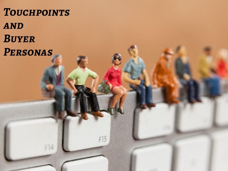 Miniature people sitting on top of keyboard - Personal branding for freelancers: Tips and tricks for your business - Image