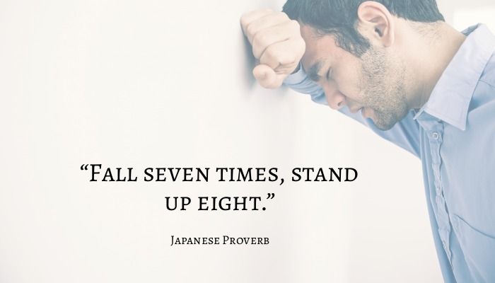 Japanese Proverb quote with a man leaning his head on a wall out of frustration - Best inspirational and motivational quotes for college students - Image