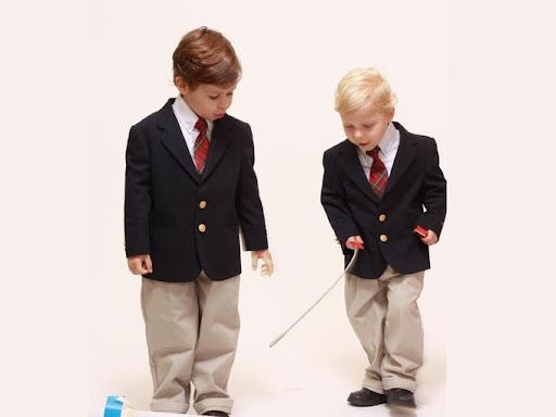 Two boys in blazers and trousers - How to design clever student council posters, 30 ideas to boost your creativity - Image