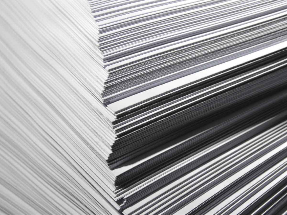 A stack of documents full frame - The ultimate brand audit guide - Image